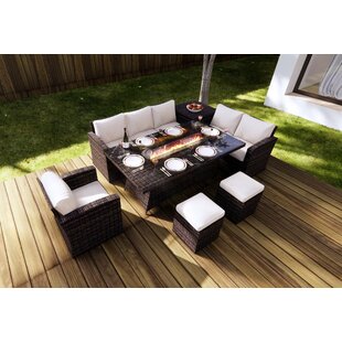 Outdoor dining table with fire pit in the online middle